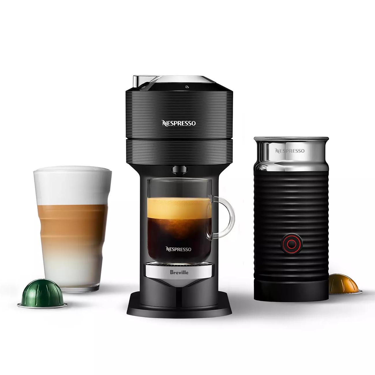 Nespresso coffee machine by Breville with a cup of coffee, milk frother, and coffee pods.