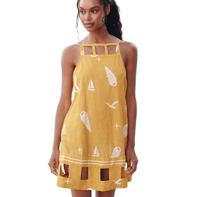 The Anthropologie Celandine Mini Dress is a yellow sleeveless dress with a square neckline featuring cut-out details. It has a nautical-themed print with white motifs like shells, boats, and birds.