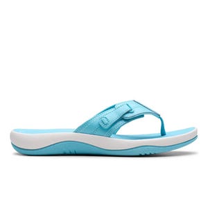 Blue thong-style sandal with a white sole, featuring stitching details and a curved, ergonomic design.