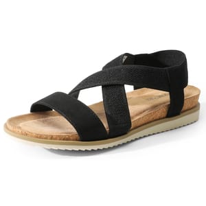 Black wedge sandals with crisscross elastic straps, a cork-textured footbed, and a beige rubber sole with ridges for traction.