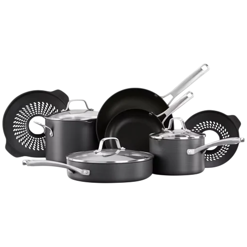 A cookware set including saucepans, skillets, and pots with lids, made of dark material with metallic handles, accompanied by two circular silicone trivets.