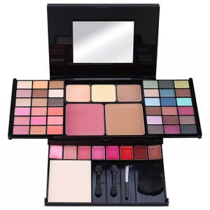Makeup palette with eyeshadows, blushes, lip glosses, and applicators in a compact design with a mirror.
