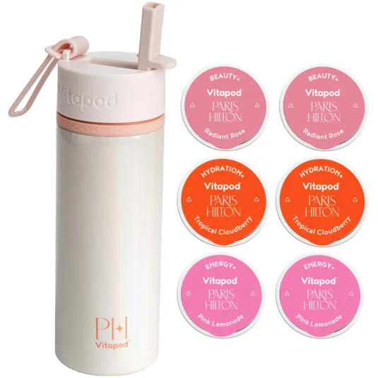 A Vitapod bottle with a pink straw lid is shown alongside six Vitapod Paris Hilton drink pods in flavors: Radiant Rose (Beauty), Tropical Cloudberry (Hydration), and Pink Lemonade (Energy).