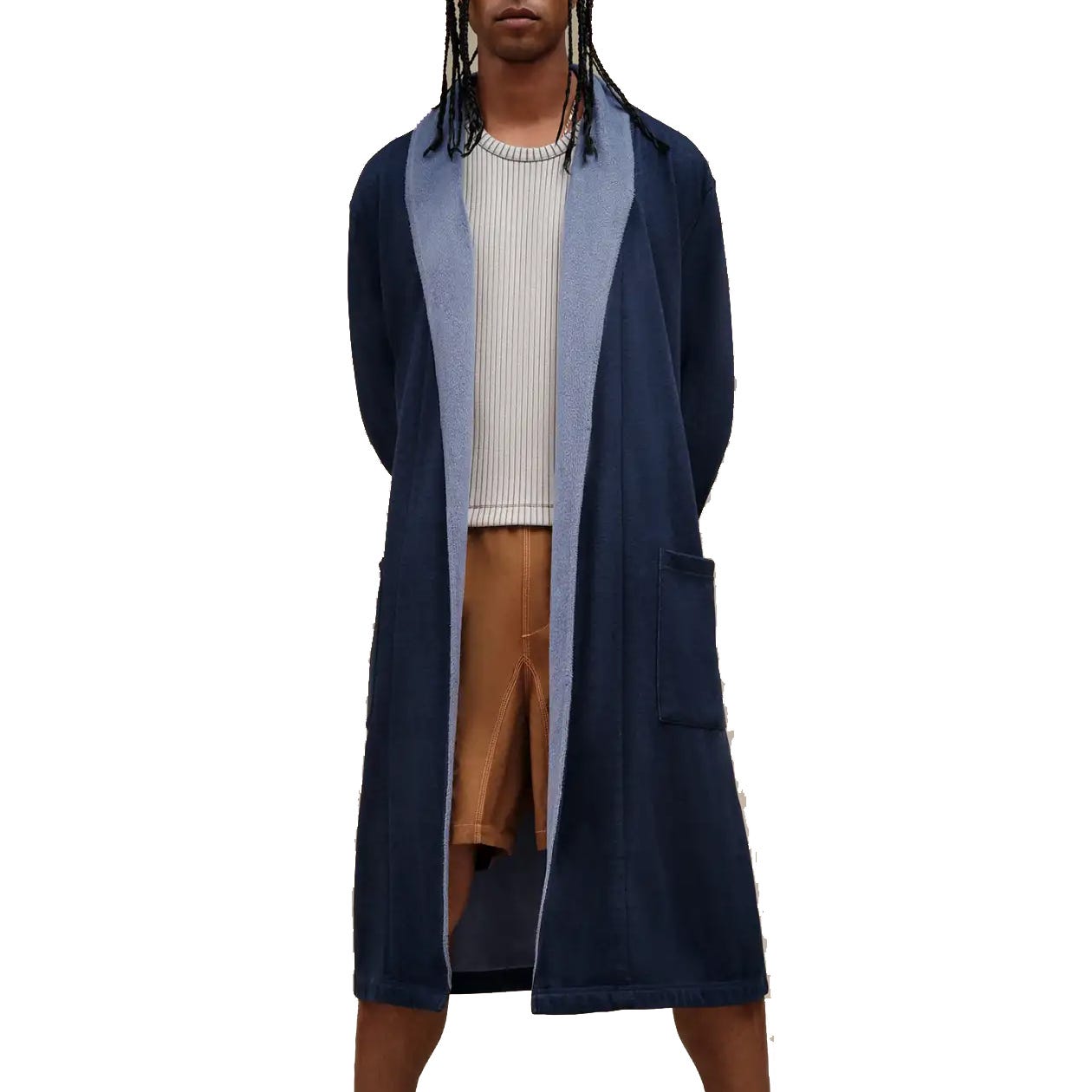 A person wears a long navy blue robe with a contrasting lighter blue lining over a ribbed shirt and tan shorts.