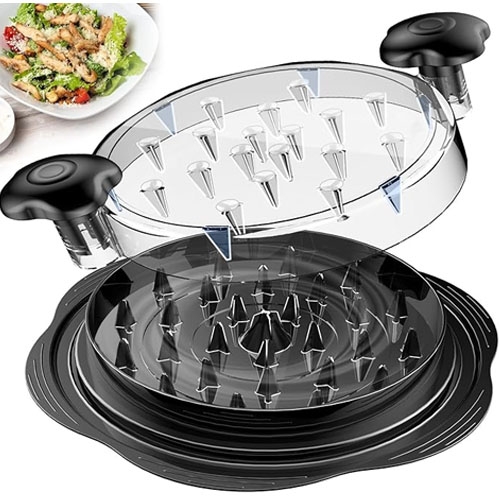 a black chicken shredding tool in front of a salad