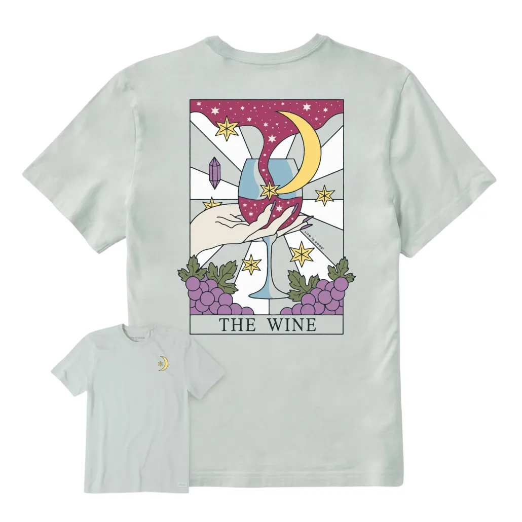 Cream t-shirt featuring a tarot-style design with a glass of wine, stars, and a crescent moon labeled \“The Wine\“ on the back, and a small crescent moon on the front.