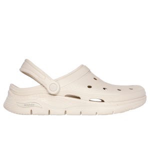 Skechers Foamies Arch Fit Clogs are beige-colored, slip-on clogs featuring perforated holes for breathability, a back strap for secure fit, and an Arch Fit design for comfort.