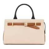A stylish handbag featuring a beige body, brown accent strap with gold hardware, and black handles.