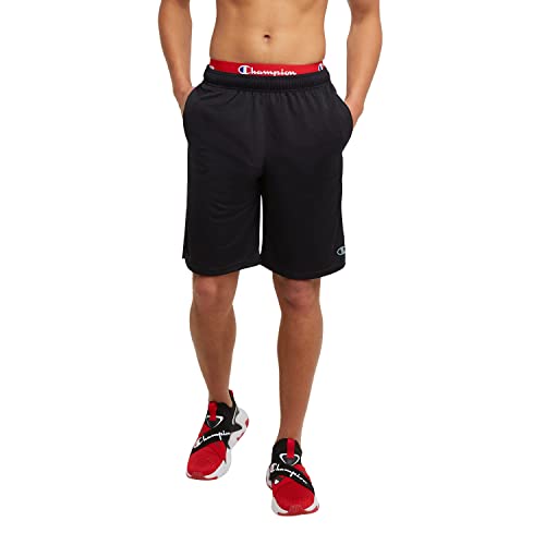Black Champion gym shorts with a red waistband and logo on the left leg, paired with black and red sneakers.