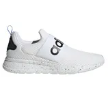 A white Adidas sneaker with a mesh upper, a black spandex strap featuring the Adidas logo, and a speckled sole.