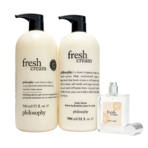 Three Philosophy \“Fresh Cream\“ products: a 32 oz hydrating shower gel, a 32 oz body lotion, and a small bottle of fragrance.