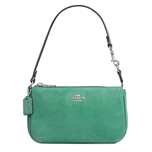 Green Coach wristlet with a silver logo, detachable strap, and signature tag.