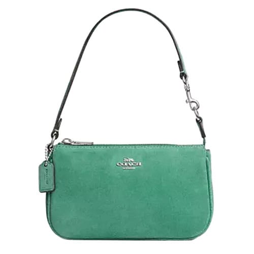 Green Coach wristlet with a silver logo, detachable strap, and signature tag.
