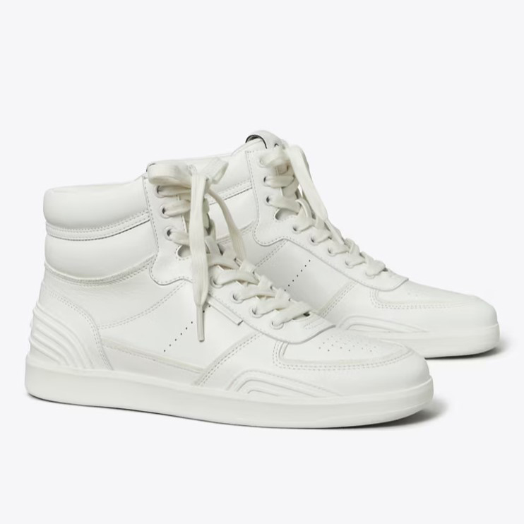 White high-top sneakers with lace-up closure and grooved side panel detailing.
