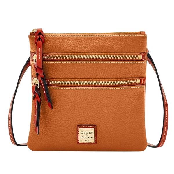 Tan leather crossbody bag with two gold zipper pockets, a braided leather detail, and a logo tag on the front.