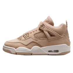 A beige sneaker featuring a suede upper, mesh panels, and a visible air unit, resembling the design and style typical of the Air Jordan 4.