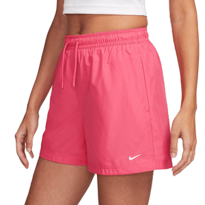 Pink athletic shorts with an elastic waistband, drawstring, and side pockets, featuring a small white Nike logo.