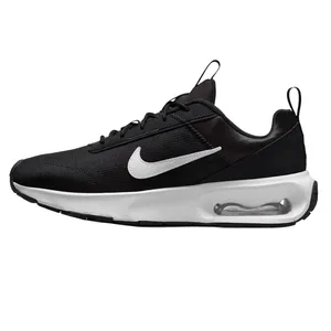 Black and white Nike sneaker with a visible air cushion in the sole, featuring the iconic white Swoosh logo on the side.