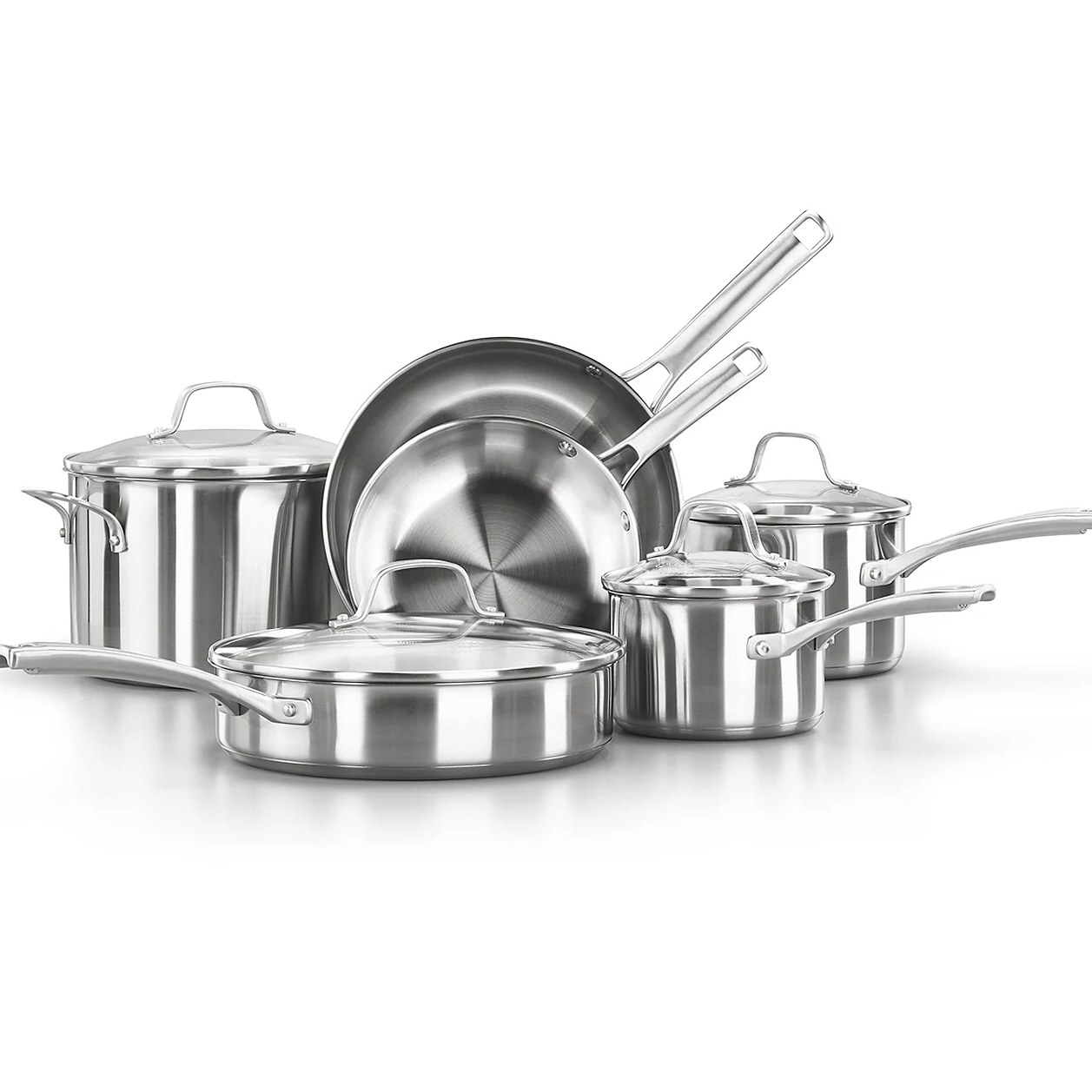 A set of Calphalon stainless steel cookware, including two frying pans, three saucepans with lids, and one stockpot with a lid, all with long handles.