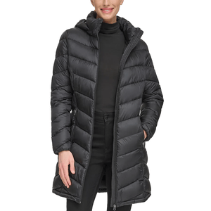 A black, knee-length, hooded puffer coat worn by a person with a front zipper closure and chevron quilting, suitable for cold weather.