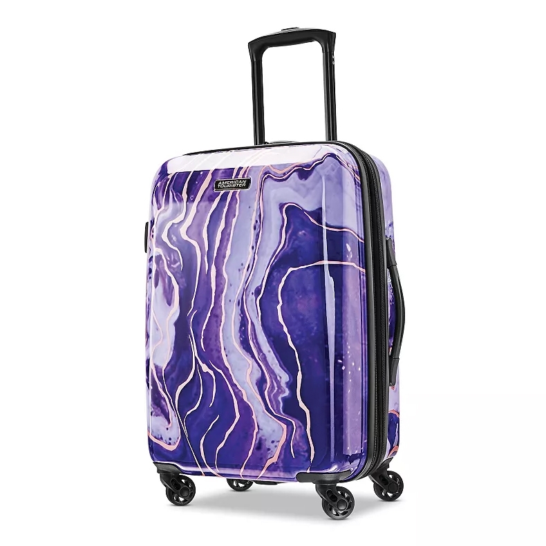 Purple and white marbled hard-shell suitcase with four wheels and a retractable handle.