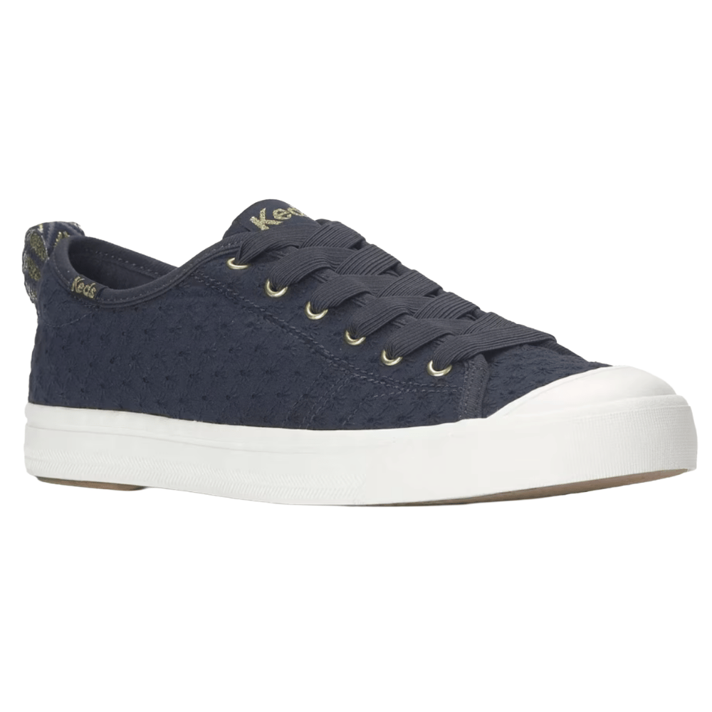 Dark blue lace-up sneakers with a textured pattern, white rubber sole, and gold detailing, featuring the Keds logo on the tongue and side.