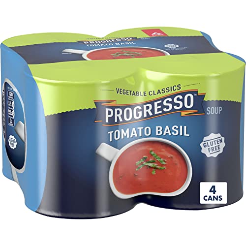 Pack of four Progresso Tomato Basil Soup cans, labeled as gluten-free and part of their Vegetable Classics line.