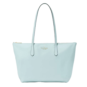 Light blue Kate Spade medium tote with two long shoulder straps and a zip closure, featuring a subtle logo on the front.