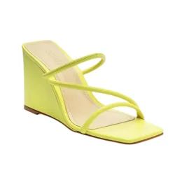 A yellow wedge sandal featuring a square toe and two thin straps, combining a minimalist design with a vibrant color.