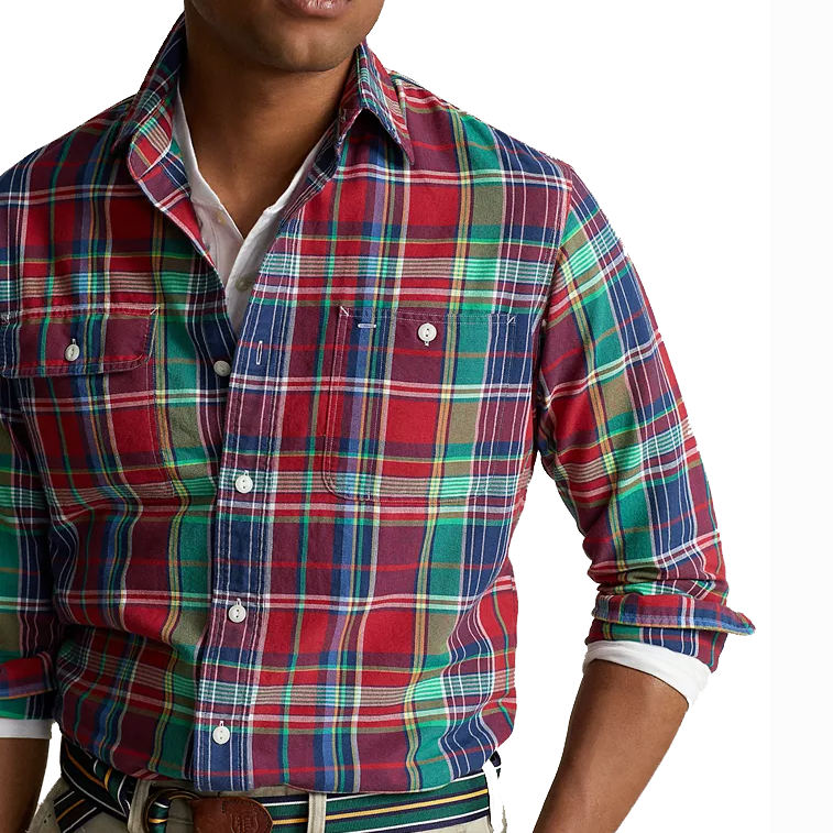 A plaid Oxford shirt by Polo Ralph Lauren with a multicolor checkered pattern featuring red, green, blue, and white hues, buttoned pockets, and a white collar.