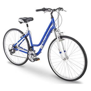 Royce Union Hybrid Bike features a blue frame with a step-through design, front suspension fork, ergonomic seat, and multiple-speed gears, suitable for both urban and light off-road cycling.
