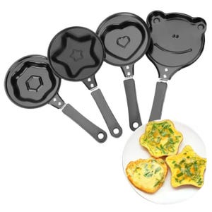 A set of four small nonstick breakfast pans with unique shapes: hexagon, star, heart, and a bear face. They are designed for making creatively shaped pancakes or eggs.