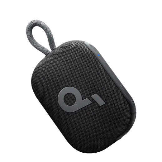 A compact, black portable Bluetooth speaker with a fabric exterior and a loop handle, featuring a minimalistic design with a logo on the front.