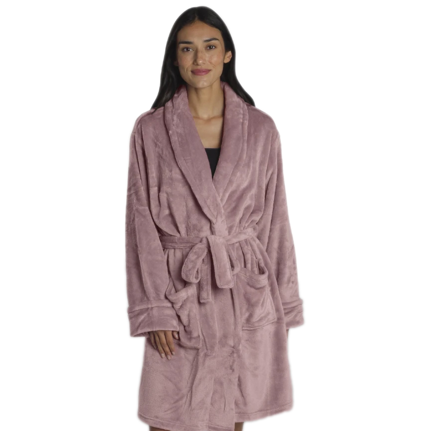 The women's velvet robe is a soft, dusty pink color with a plush texture. It features long sleeves, a shawl collar, two front pockets, and a tie belt for closure.