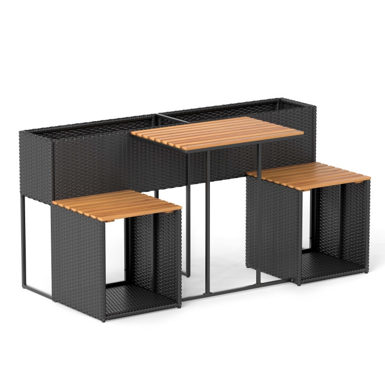 A black rattan outdoor bar set with a built-in planter, featuring a table and two benches with wooden slat tops.