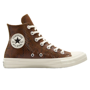 Converse Women's Snakeskin Shoes feature a high-top design with a brown snakeskin pattern, white laces, and a classic white rubber sole. The shoe displays the Converse All Star logo patch on the side.