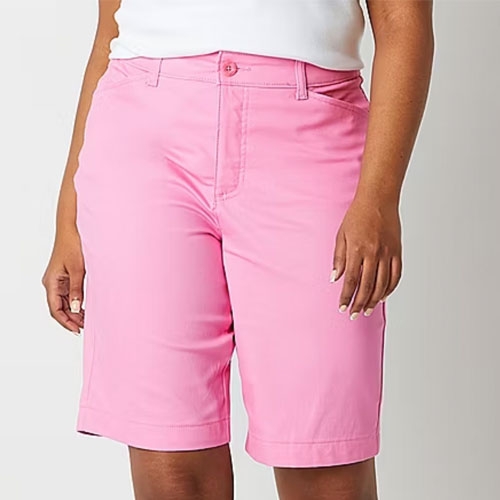 A person wearing pink knee-length shorts.