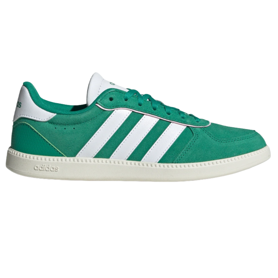Green and white Adidas sneakers featuring the signature three stripes on the side and a low-profile design with a textured white sole.