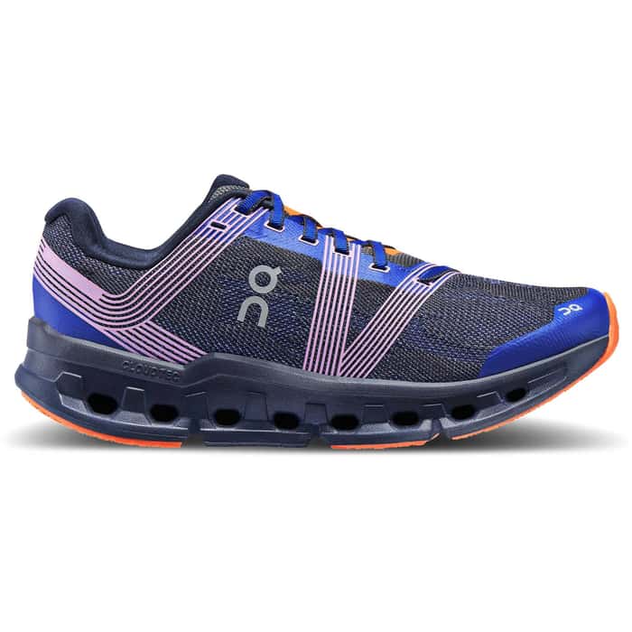 A blue and purple running shoe with orange accents and a circular logo on the side.