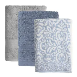Three folded towels in different patterns and textures: one solid gray, one textured blue, and one white with blue floral patterns.