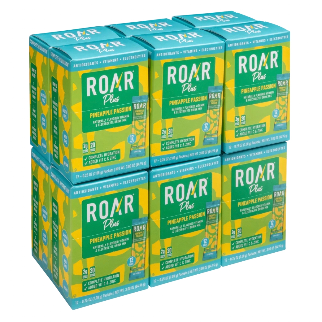 Roar Plus Pineapple Passion Drink Mix, 144-pack, features antioxidants, vitamins, and electrolytes. It offers 12 boxes with 12 packets each, containing 2g sugar and 20 calories per serving.