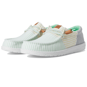 Hey Dude Men's Wally Shoes have a casual design featuring pastel stripes in green, yellow, and blue with a white speckled sole. They include lightweight fabric, moc toe stitching, and a slip-on style with adjustable laces.