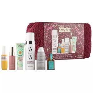 This is a set of various hair care products including shampoos, conditioners, and treatment oils, bundled with a knitted burgundy hair wrap, all branded by Sephora.