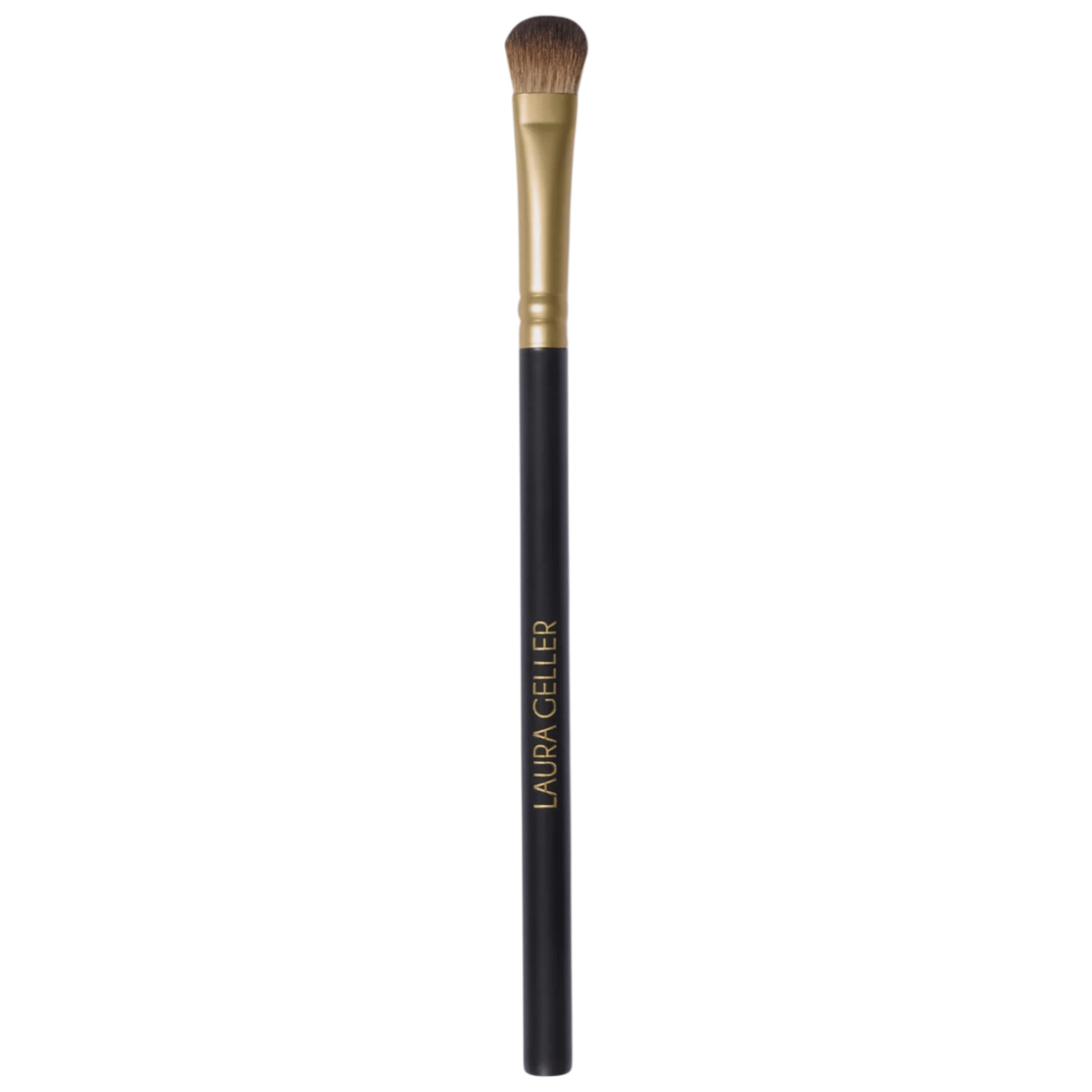 An eyeshadow brush with a gold ferrule and a black handle inscribed with \“LAURA GELLER.\“