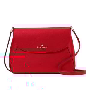 A red Kate Spade Monica Medium Flap Crossbody bag featuring pebbled leather, a flap closure, and an adjustable shoulder strap. It displays a gold-tone logo on the front.