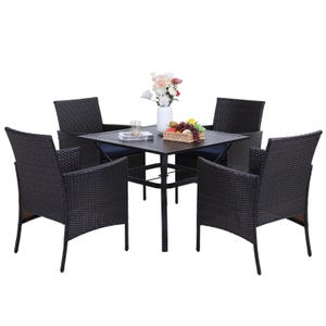 A 5-piece patio dining set includes a square black table and four wicker chairs. The table is adorned with a vase of flowers and a basket of fruit.