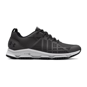 Black Under Armour Micro G tactical shoes with a white sole, featuring the brand's logo on the side and a reinforced design for durability.