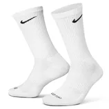 A pair of white crew socks with a black Nike swoosh logo. The socks are ribbed and have \“Dri-FIT\“ text on the toes.
