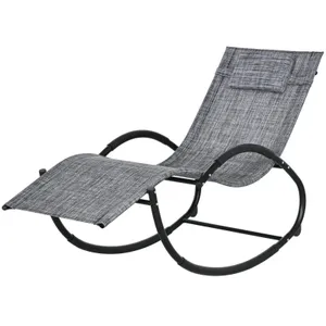 Modern rocking lounge chair with a fabric-covered seat and a black metal frame, featuring a headrest and a curved base for gentle rocking motion.