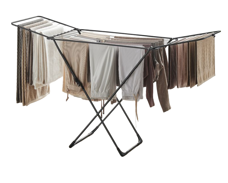 A black collapsible drying rack holds beige and brown clothing.